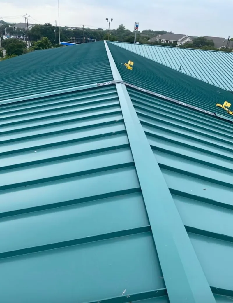 Green commercial metal roof ridge and valley for Metal Roof Repair in Orangetown